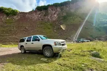 Chevrolet Suburban 2015 4x4 rental vehicle photo 3