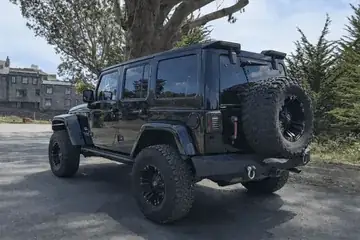 Jeep Wrangler 2016 4x4 rental vehicle photo 2